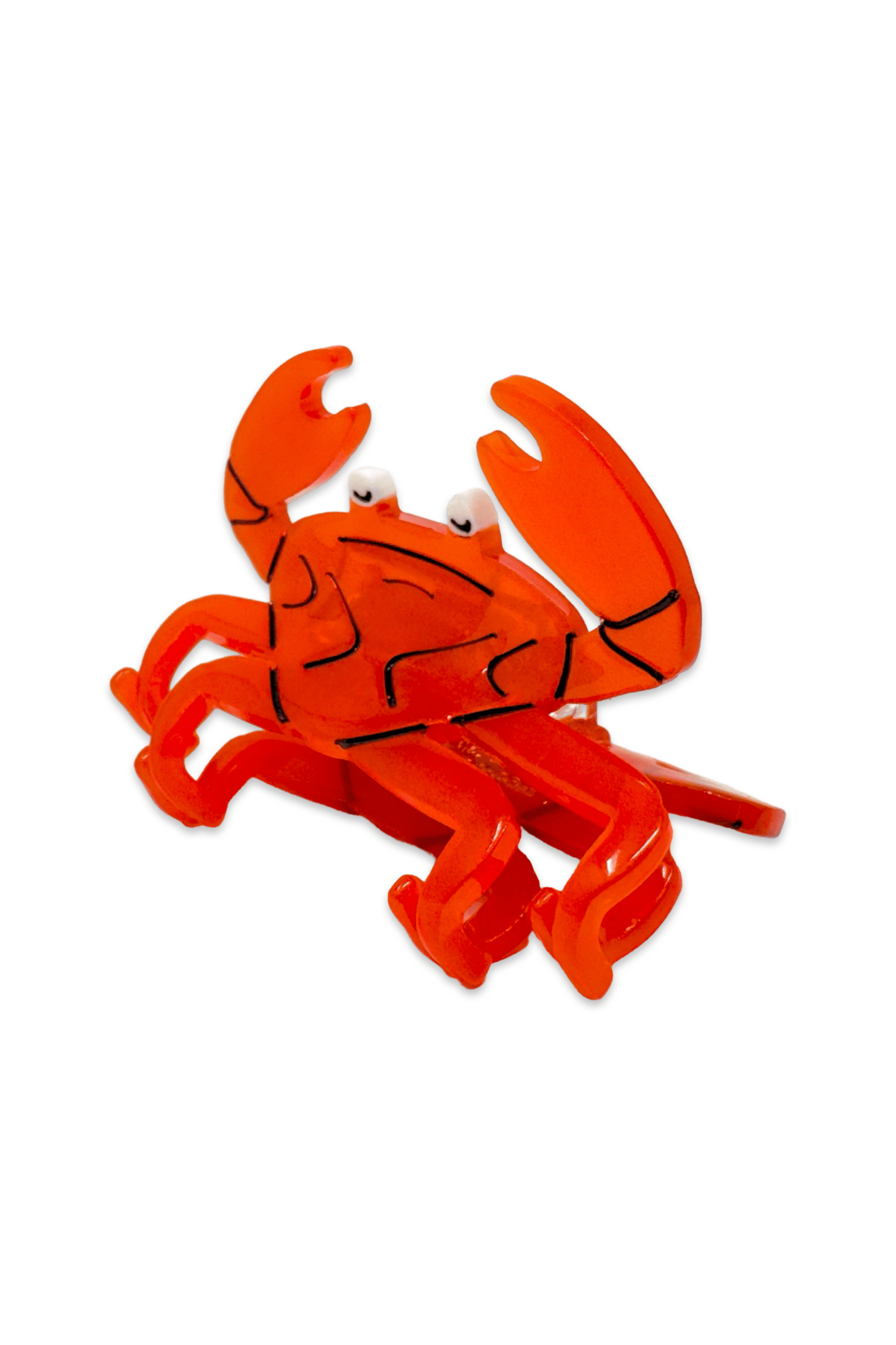 Red crab hair clip on a white background