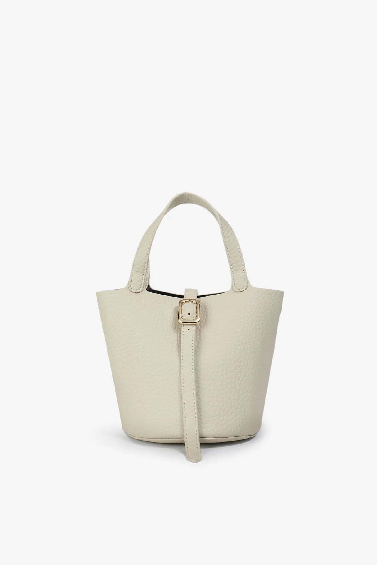 Beige handbag with a strap on a white background