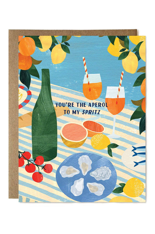 Greeting card with beach scene, drinks, and text 'You're the aperol to my spritz'.
