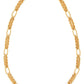 Gold chain necklace on a white background