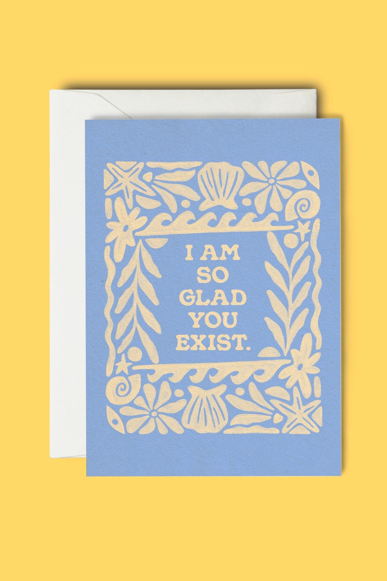 Greeting card with floral design and text on a yellow background